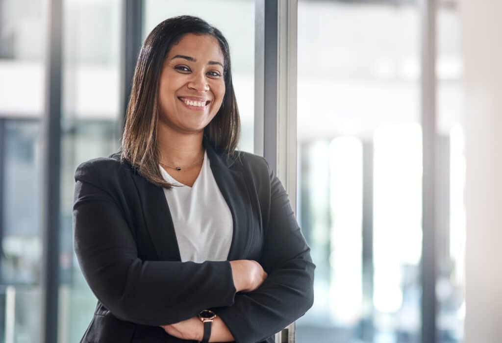 Portrait of a confident young businesswoman standing in an office.